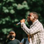 Black Lives Matter activist speaks to a crowd. Photo courtesy of Edward Howell on Unsplash.
