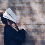 photo of girl covering her face