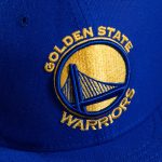 Photo of a Golden State Warriors hat. Photo courtesy of Mick Haut on Unsplash.