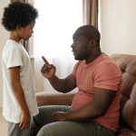 Father Talking to his Son. Photo courtesy of August de Richelieu on Pexels.