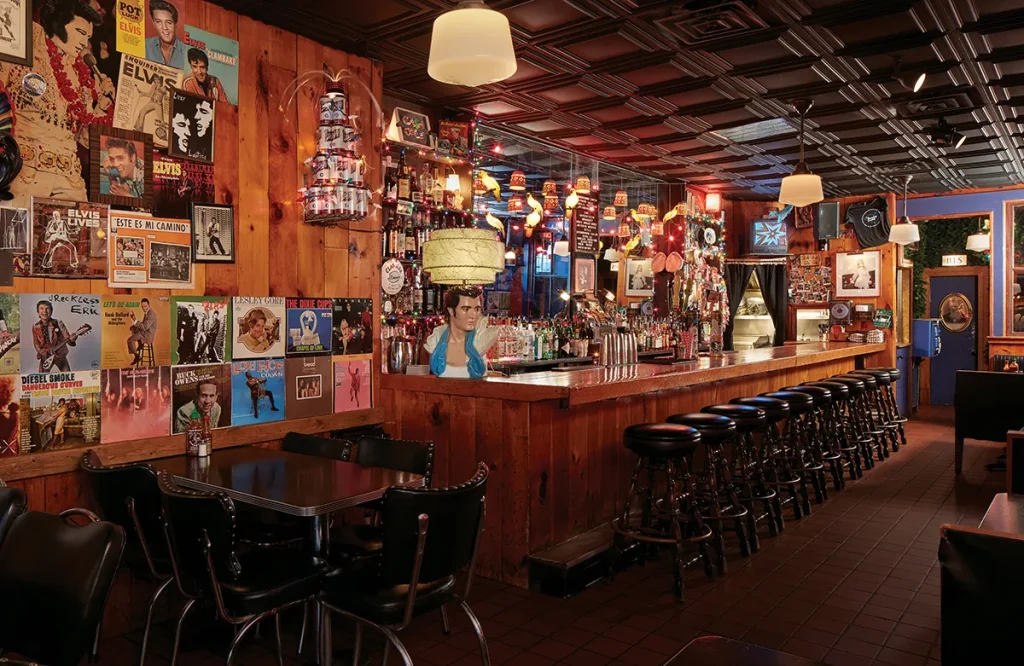 Inside the Delux Cafe. Lots of funky lamps and fun postcards on the walls.