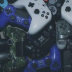 Photo of video game controllers. Photo courtesy of Pragii on Unsplash.