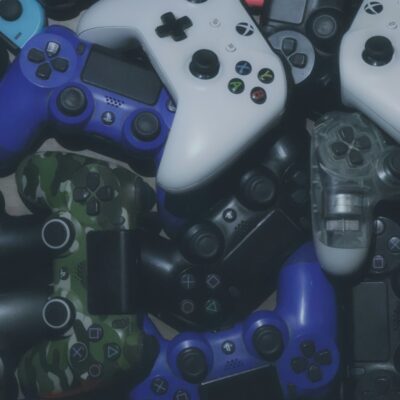 Photo of video game controllers. Photo courtesy of Pragii on Unsplash.